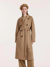 a lady in camel pure cashmere double-breasted coat with beret